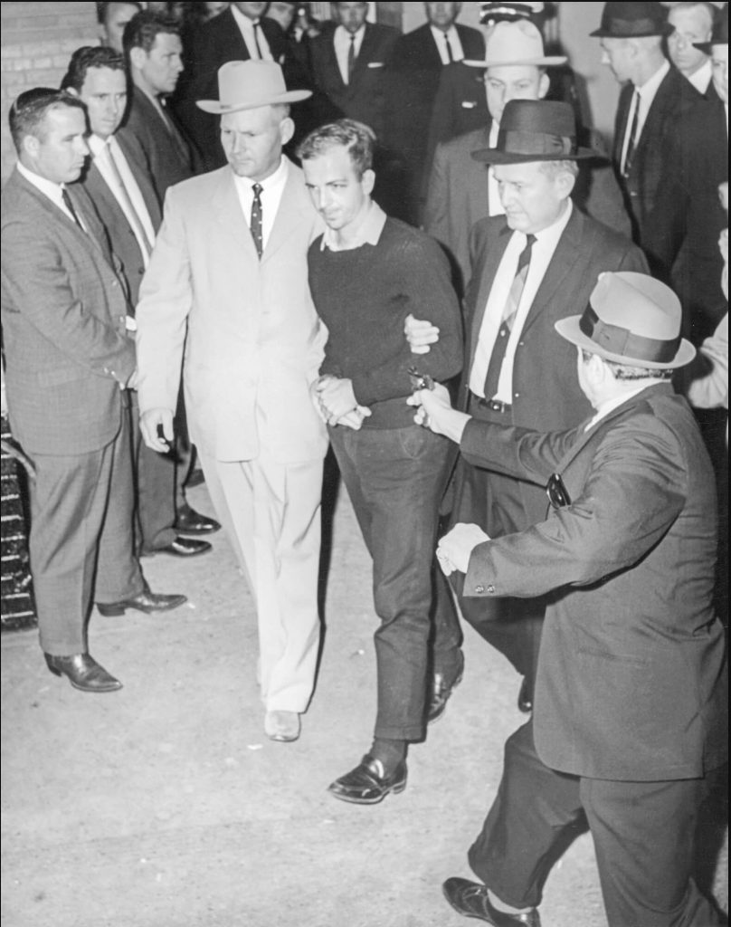November 24 - A moment before local nightclub owner Jack Ruby fatally shoots Lee Harvey Oswald, accused of assassinating President John F. Kennedy two days earlier. Jack Beers Jr., Dallas Morning News