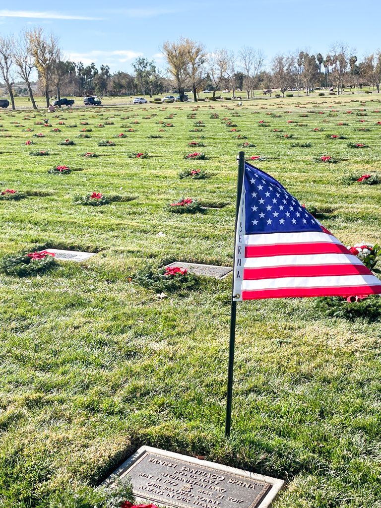 National Wreaths Across America Day. Caption: Volunteers from all walks of life placed holiday wreaths on the graves of veterans resting at the Riverside National Cemetery. Credit: Photo by Don Ray