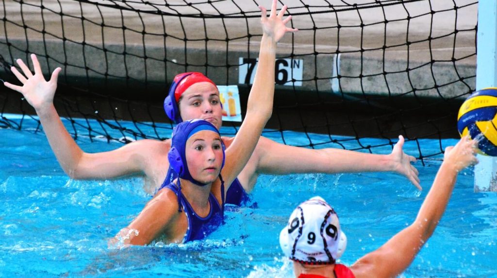 Norco’s Lily Helberg (middle) and goalie Annie Peak (top) look to block Corona Centennial’s Emma Armstrong’s (9) shot on goal.