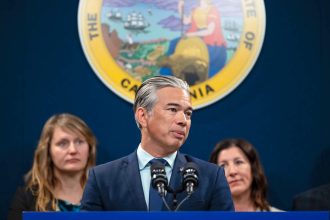 California Closes Prisons. Attorney General Rob Bonta addresses the media during a press conference announcing new gun legislation targeting the state's public carry laws on Feb. 2, 2023.  Credit: Photo by Miguel Gutierrez Jr., CalMatters