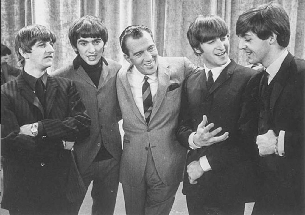 February 9 - (L-R) Ringo Starr, George Harrison, Ed Sullivan, John Lennon, Paul McCartney Credit: Smithsonian’s National Portrait Gallery