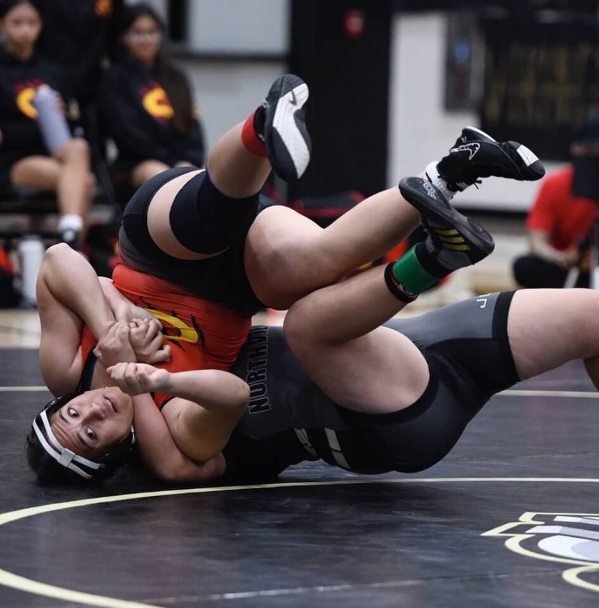 Corona's Jestinah Solomua rallied from an early deficit to defeat Rebecca Juarez of Covina Northview in a 194-pound bout in the CIF Div. 1 dual meet wrestling championships at Northview Tuesday. Corona was trailing, 27-3 when Solomua's win turned the tide as Corona closed the gap to 27-18, and later to 33-27. But the Vikings pulled away to a 39-27 win. The 2 schools have competed for the D1 championship all 4 years of the tournament. It was the third consecutive title for Northview after Corona won the initial championship in 2021. Photo by Jerry Soifer