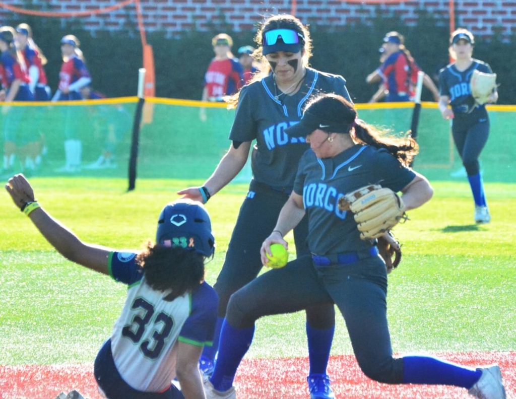 Featured High School Sports Photos and Scoreboard 3-1-24. Chino Hills runner Ceala Horn (33) is out at second stealing while Norco shortstop Madyson Aguilera (middle) watches second baseman Tamryn Shorter (right) tag second base. The Huskies defeated the Cougars 3 – 2 in tournament action.