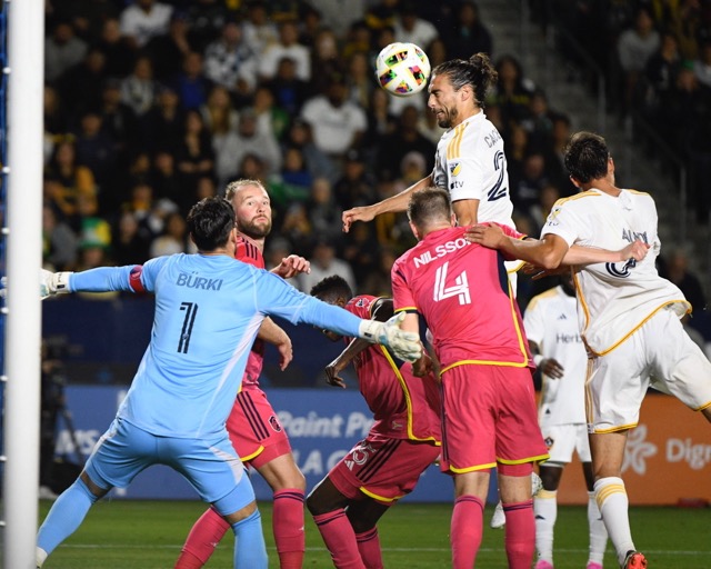 LA Galaxy forward Martin Caceres tries an unsuccessful header Saturday against St. Louis City in an MLS game played at the Dignity Health Sports Park in Carson. The two teams tied, 3-all.
Credit: Photo by Jerry Soifer
