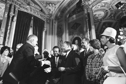 Caption: United States President Lyndon B. Johnson, Martin Luther King Jr., and Rosa Parks at the signing of the Voting Rights Act March 15. Credit: LBJ Library photo by Yoichi Okamoto