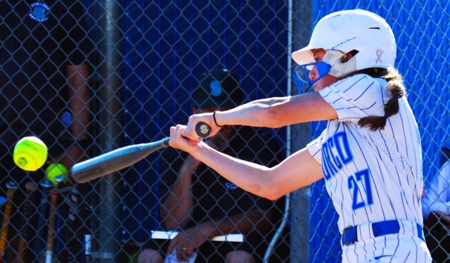 Norco’s Kaley Cook hammers a single to center during the Cougars 16 – 0 victory over Santiago. 
Credit: Photo by Gary Evans
