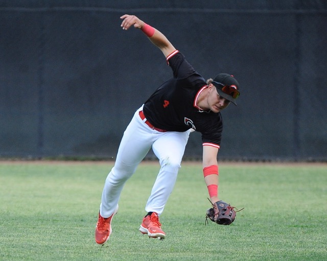 Corona Centennial center fielder Ryder Dykstra sprints in to snare a shallow fly ball in last Friday’s 6-0 win over visiting Eastvale Eleanor Roosevelt, sweeping the three-game Big VIII League series.
Credit: Photo by Jerry Soifer
