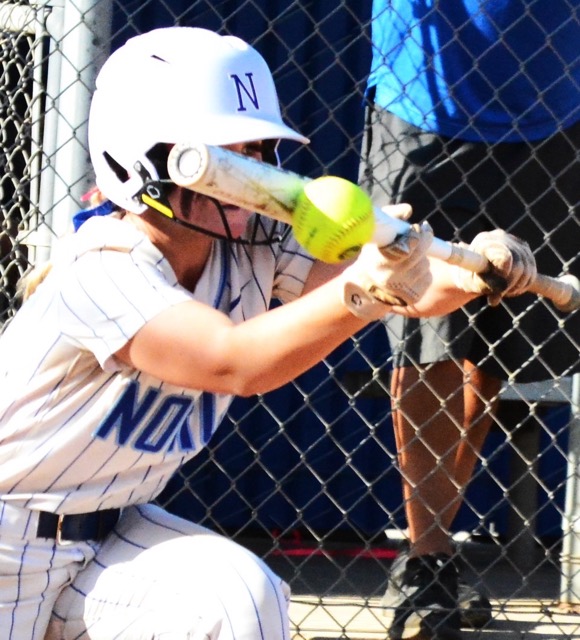 Norco’s Ashlyn Braun lays down a bunt in the bottom of the 7th to advance the runner, but the Cougars could not break a 1 – 1 tie with Great Oak. Down two runs in the 8th, the Cougars got two runners on but they were stranded.
Credit: Photo by Gary Evans
