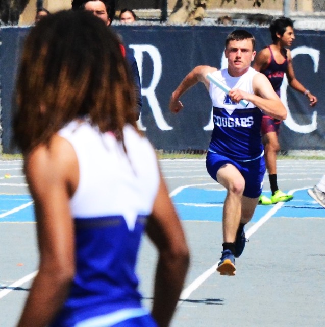 CIF. Jayden Sheen eyes teammate Akili Weusi to hand the baton off during the CIF Unified Boys Track Finals 4 by 100 relay race. Noah Varella had the first leg, Sheen second, Weusi third, and Kai Cephas had the anchor leg. The Cougars took third place in the race.