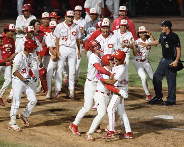 Corona Baseball Championship Photos. Corona's Sam Burgess is hugged after he hit a three-run homer over the right field fence Saturday as Corona defeated Studio City Harvard-Westlake in the CIF Div.1 championship game at the Lake Elsinore Storm Diamond.