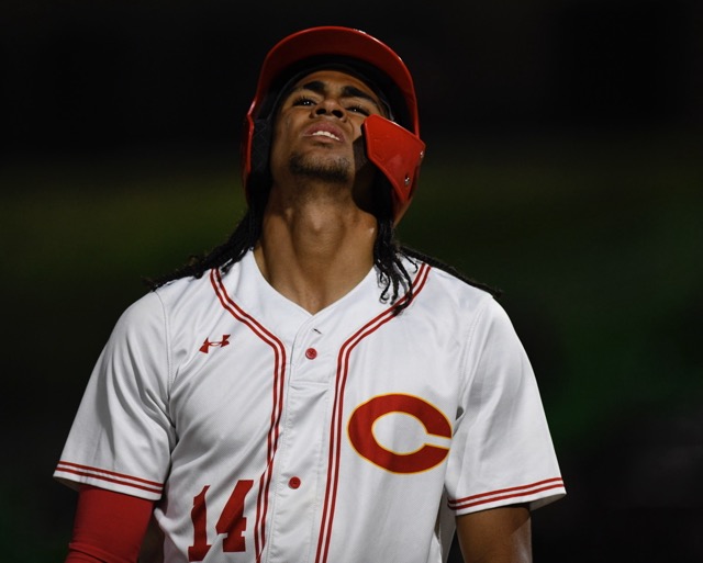 Corona's Anthony Murphy grimaces after being hit by a pitch. Photo by Jerry Soifer