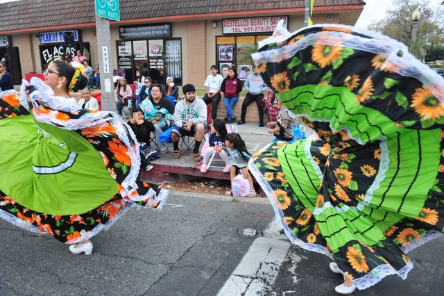Spectators have an up-close look at dancers during Corona's Cinco de Mayo parade on Sixth Street, last Saturday.