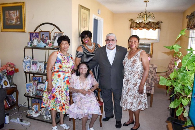 Beloved Perris Centenarian. Daughter Paulette Paddyfoot, Grand Daughter Georgette Bowen, Mayor Michael Vargas City of Perris, Daughter Beverly Hibbert, surround Lena May McFarlane as she celebrates her 100th birthday in 2022.