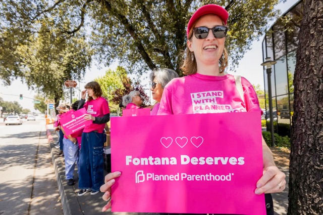 Planned Parenthood supporters rally outside Fontana City Hall on May 14, 2024 because city officials stopped a new clinic from opening after hearing abortion opposition. Credit: Photo by Ted Soqui for CalMatters