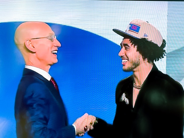 Jard McCain. : NBA Commissioner Adam Silver and Jared Share smiles after Silver announed McCain as the 16th pick in the draft.