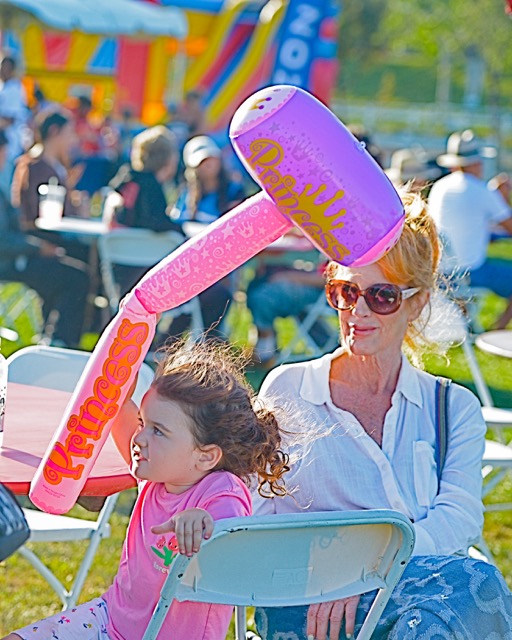 Eastvale's Oakley Cavett, 3, plays with an inflatable hammer by his grandmother, Laura Stevenson. 