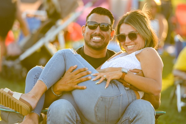 Ontario residents Jordi and Jillian Ubaldo enjoy the music of the band "Bruno and the Hooligans" Friday at the Picnic in the Park in Eastvale.
Credit: Photo by Jerry Soifer
