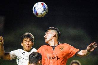 Orange County Soccer Club’s Cameron Dunbar (7) goes for a header against Oakland in a USL game Saturday at Great Park in Irvine. Oakland won, 2-0. Credit: Photo by Jerry Soifer