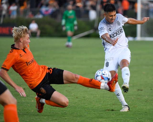 The Orange County Soccer Club’s Ben Norris drives to block a shot by Memphis' Samuel Careaga in a USL game Saturday at Great Park in Irvine. Orange County won, 4-0.