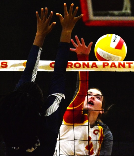 Corona’s Sam Gollaher (10) sees her touch just get over the next and past a Fontana Summit player.