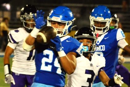 Norco’s Maddox Barrios (24) cuts in front of Rancho Cucamonga’s Tyree Wilson (3) for an interception that led to a first-half-ending field goal. The Cougars fought back from a 21-3 deficit, to take a late 25-24 lead. Rancho returned the ensuing kickoff for a touchdown, prevailing 30-25.