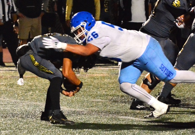 Featured Photos 9-27-24 . Norco’s Marshawn Dunning (56) sacks Citrus Valley Quarterback Dominic Robles during the Cougars 17 – 10 victory over the Blackhawks. Credit: Photo by Gary Evans