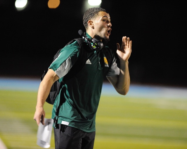 Riverside Notre Dame assistant coach Jadsen Roe shouting instructions in the first half.