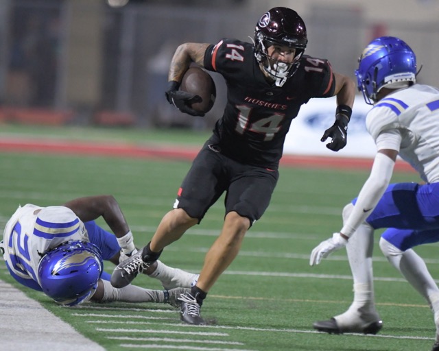 Featured Photos 09-06-2024. Corona Centennial wide receiver Noah Westbrook navigates the sideline following a completion.