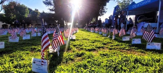 Flags honoring the thousands of lives lost in the multiple attacks committed by commandeering highjacked commercial airplanes on September 11, 2001, were placed on the Corona Civic Center lawn on 6th Street by volunteers before Wednesday’s remembrance ceremony. Photo by Gary Evans