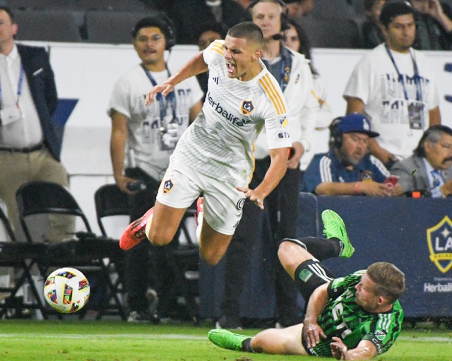 The LA Galaxy's Dejan Joveljic who scored the game-winning goal to defeat Austin FC Saturday goes airborne late in the MLS game Saturday at the Dignity Health Sports Park in Carson. The Galaxy won, 2-1. Credit: Photo by Jerry Soifer