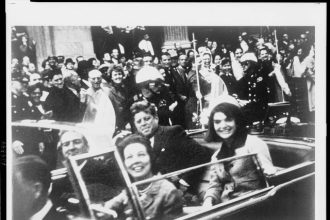 November 22. John F Kennedy riding in the Presidential Limo with his wife Jacqueline, Texas governor John Connally, and Connally's wife Nellie on the day of his assassination.