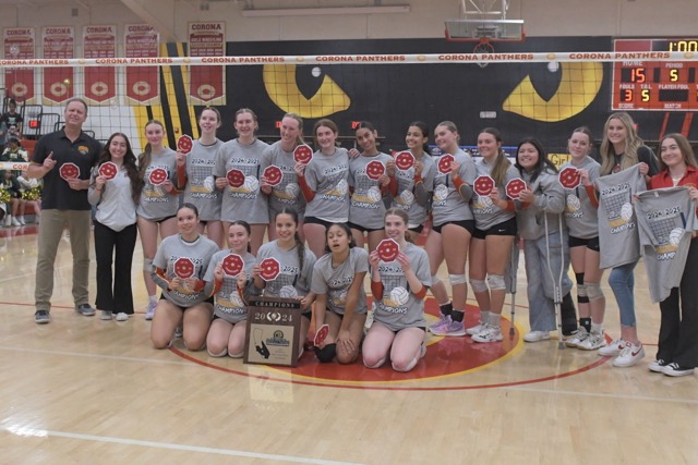 The Panthers pose for their Championship photo with commemorative plaque and patches. Photo by Jerry Soifer