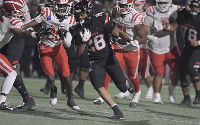 Corona Centennial running back Dean Gibson breaks loose against Santa Ana Mater Dei. 