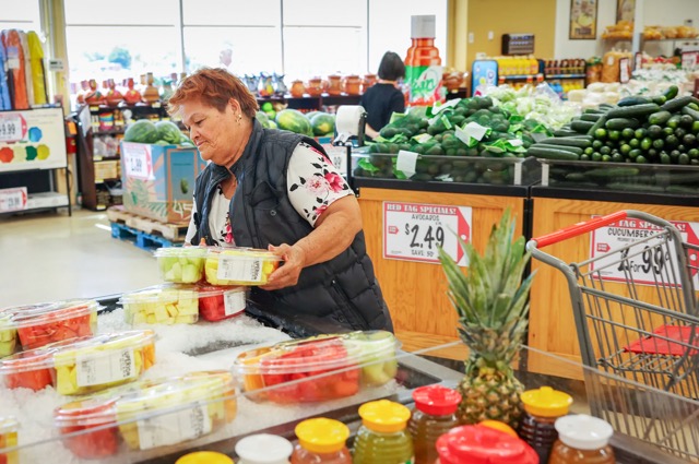 Caption: Mirna Hernandez shops at Superior Groceries in Victorville on Aug. 16, 2024. Minimum Wage. Credit: Photo by Ted Soqui for CalMatters