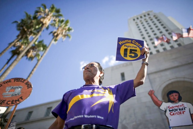 Fast food workers and their supporters join a nationwide protest for higher wages and union rights outside City Hall in Los Angeles on Nov. 10, 2015. 

Credit: Photo by Lucy Nicholson, Reuters