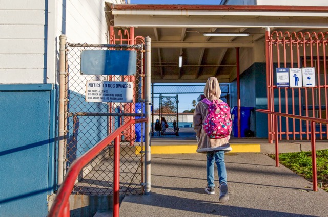 School Bonds. ​​A student enters Stege Elementary School in Richmond on Feb. 6, 2023. Inland Empire school districts are proposing 22 local bonds.  Credit: Photo by Shelby Knowles for CalMatters