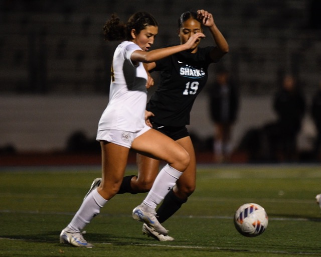 Featured Photos 12-20-2024. Temecula Valley’s Katarina Pinero battles Santiago's Gabi Germain for the ball in the second half. Credit: Photo by Jerry Soifer