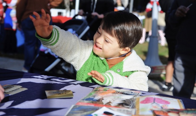 Oliver Hernandez, 5, is one of more than 600 children receiving a gift at the Annual Kids & Cops Holiday Magic event at the Corona Civic Center, thanks to the generosity of residents and businesses. See Page 10.
Credit: Photo by Jerry Soifer
