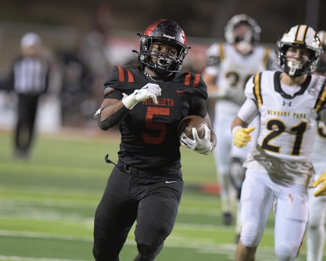 Featured Photos 12-05-2024. In what was a key play of the game, Murrieta Valley's Dorian Hoze races for a score with Newbury Park's Shane Rosenthal in pursuit. But Hoze lost the football with Newbury Park recovering. Photo by Jerry Soifer