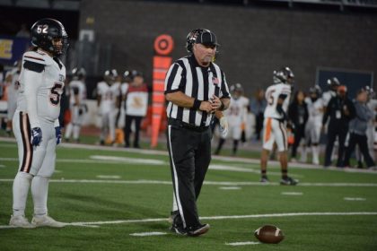 Norco resident Charlie Chastain worked as the umpire in the Fresno Central-Huntington Beach Edison CIF State championship bowl game Saturday at Saddleback College in Mission Viejo. Credit: Story and Photo by Jerry Soifer