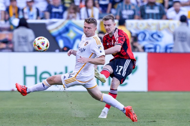 Coachella Valley Invitational. New York Red Bulls midfielder Cameron Harper (17) shoots past Los Angeles Galaxy defender John Nelson (14) during the second half of the MLS Cup championship soccer match Saturday, Dec. 7, 2024, in Carson, Credit: AP Photo/Etienne Laurent