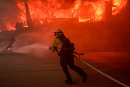 January Fires. A firefighter battles flames from the Palisades Fire in the Pacific Palisades neighborhood of Los Angeles on Jan. 7, 2025.  Credit: Photo by Eric Thayer, Getty Images