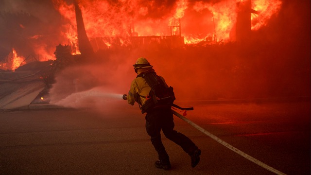 January Fires. A firefighter battles flames from the Palisades Fire in the Pacific Palisades neighborhood of Los Angeles on Jan. 7, 2025.  Credit: Photo by Eric Thayer, Getty Images