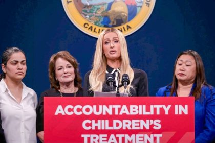 Troubled California Teens. Flanked by legislators, Paris Hilton speaks in support of Senate Bill 1043 during a press conference at the Capitol Annex Swing Space on April 15, 2024.  Credit: Photo by Miguel Gutierrez Jr., CalMatters