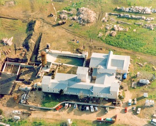 February 28. Aerial View of the Branch Davidian Compound near Waco, Texas during the siege. Credit: FBI