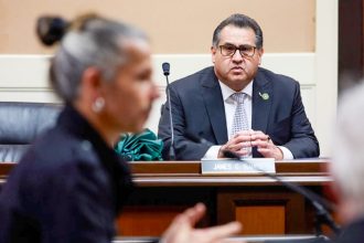 Domestic Violence Protections. Assemblymember James Ramos, part of the Select Committee On Happiness And Public Policy Outcomes, listens to a speaker during an informational hearing at the state Capitol in Sacramento on March 12, 2024.  Credit: Photo by Fred Greaves for CalMatters