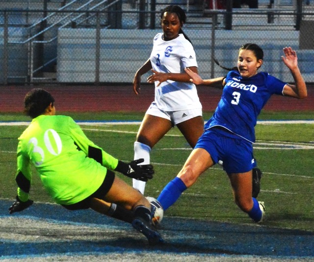 Norco’s Emmalee Snow (3) has her sliding shot blocked by Culver City goalie Ava Hunter (left) while Georgia Smith (3) chases.  The Centaurs broke open a 2 – 2 tie with five minutes left in the game to defeat the Cougars 3 – 2 in the CIF Division 3 playoffs.
Credit: Photo by Gary Evans
