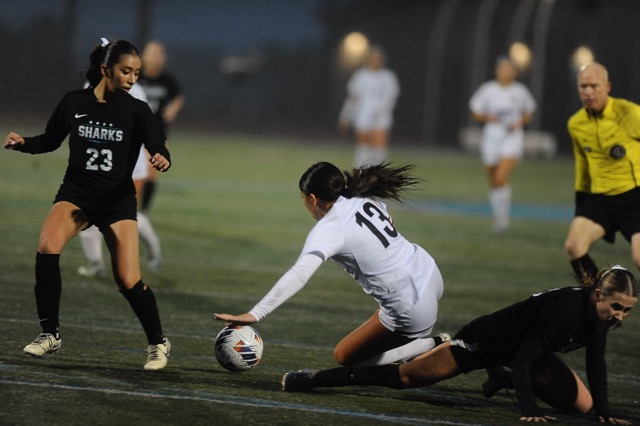 Santiago’s sophomore defender Jadyn Vazquez (23) eyes Palos Verdes forward Gemma Pappas and the ball following a collision near the goal in the second half of the CIF Open Division playoff game won by Palos Verdes, 1-0.