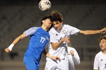 Caption: Calabasas’ Leo Vacca, (right), heads the ball against Norco's senior mid-fielder Bryan Vazquez in the second half of a CIF Div. 2 second-round playoff game won by the visiting Coyotes on penalty kicks. No goals were scored in 100 minutes of regulation and overtime. Photo by Jerry Soifer