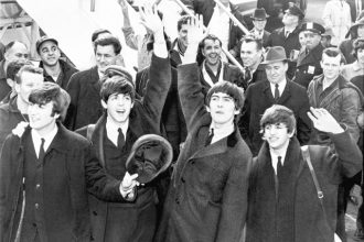 Credit: Library of Congress Caption: The Beatles land at JFK airport in New York, February 7, 1964, for their first American performances including the Ed Sullivan Show.